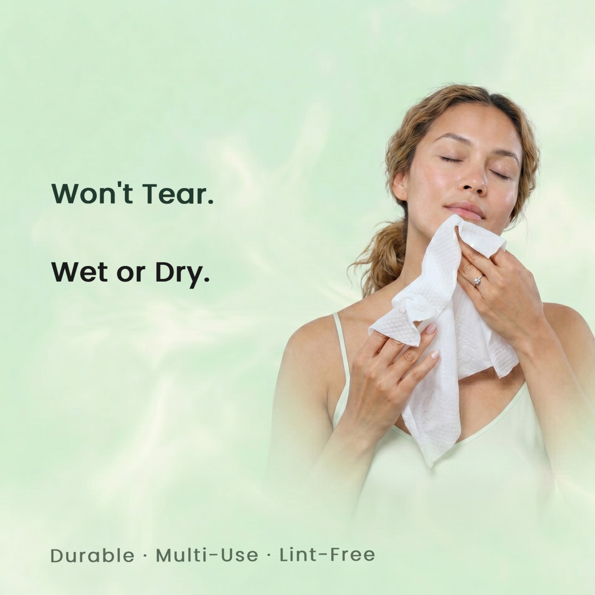 Woman using inficare face towels with text on a light green background. Won't tear. Wet or Dry.